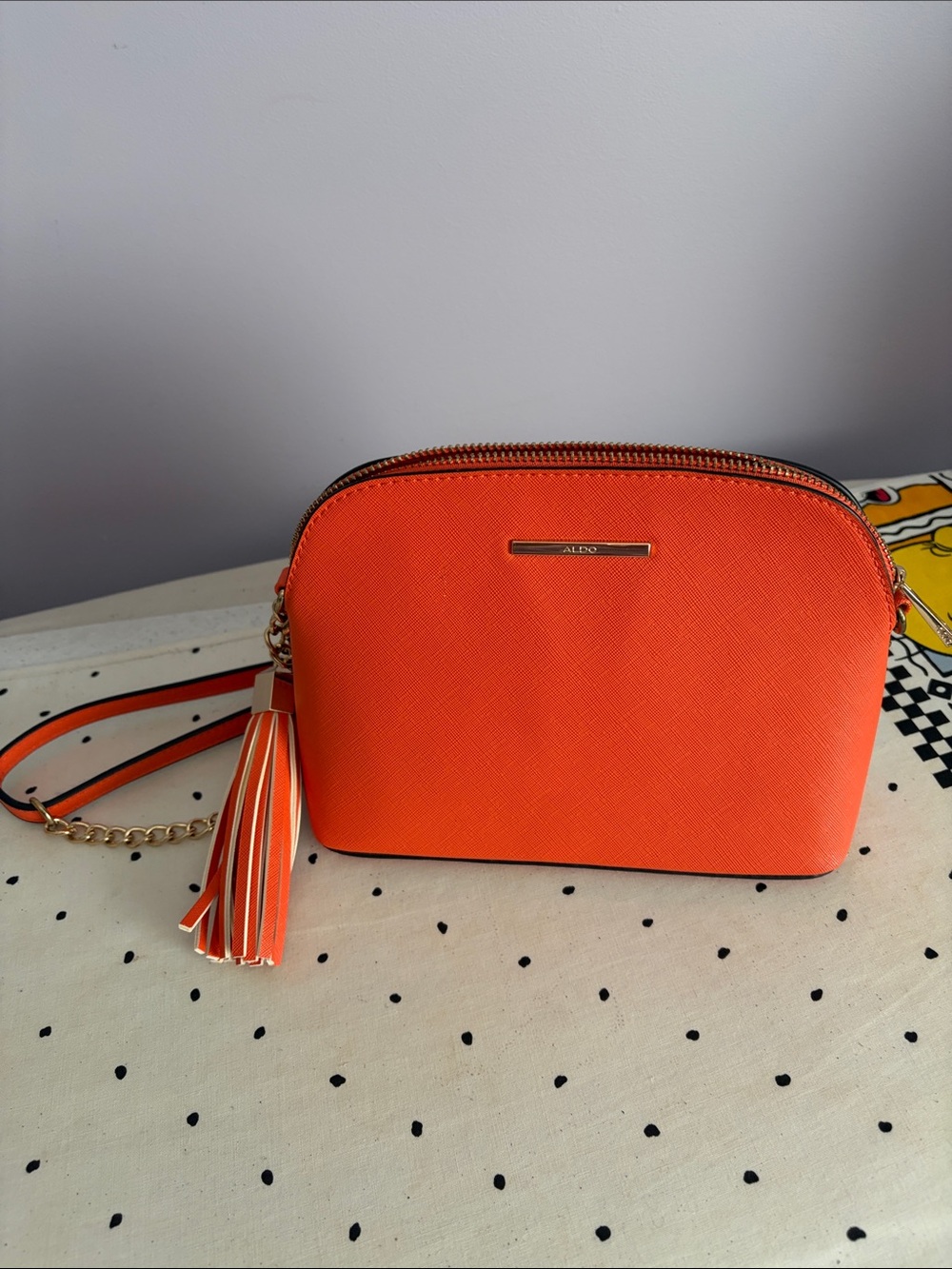 Aldo Bright Orange Crossbody Bag with Tassel Accent